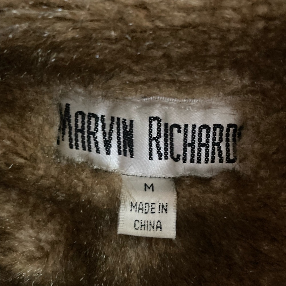 Vintage Circa 1990’s fur lined jean jacket.